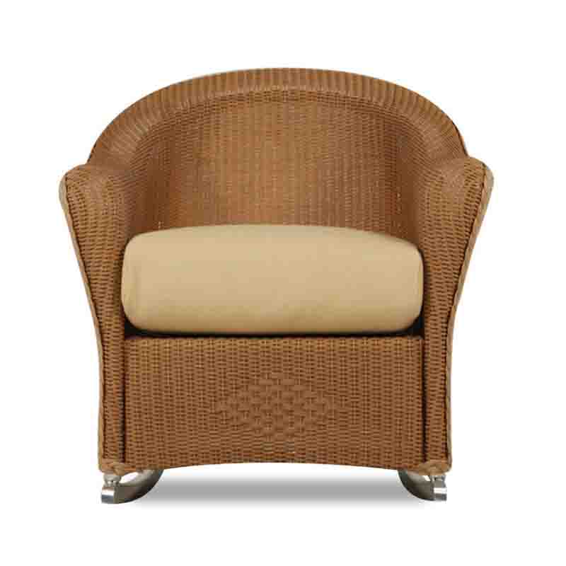 Wicker armchair with beige cushion on a white background