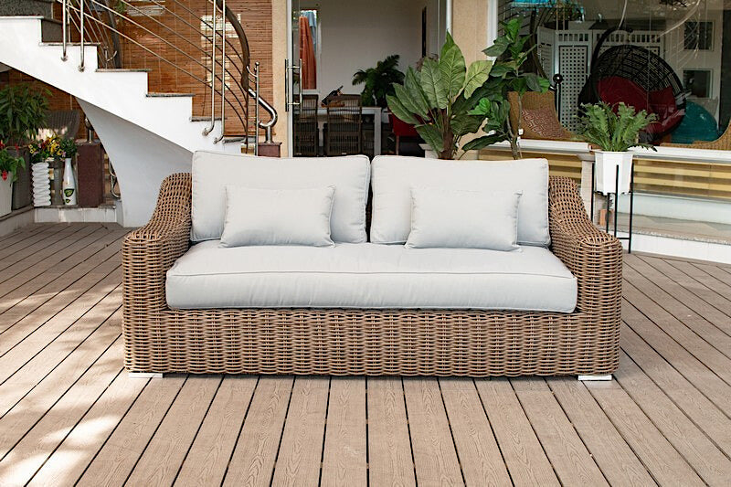 OUTSY Lana 4-Piece Outdoor Wicker Furniture Set in Brown with Wicker Coffee Table - sofa front view