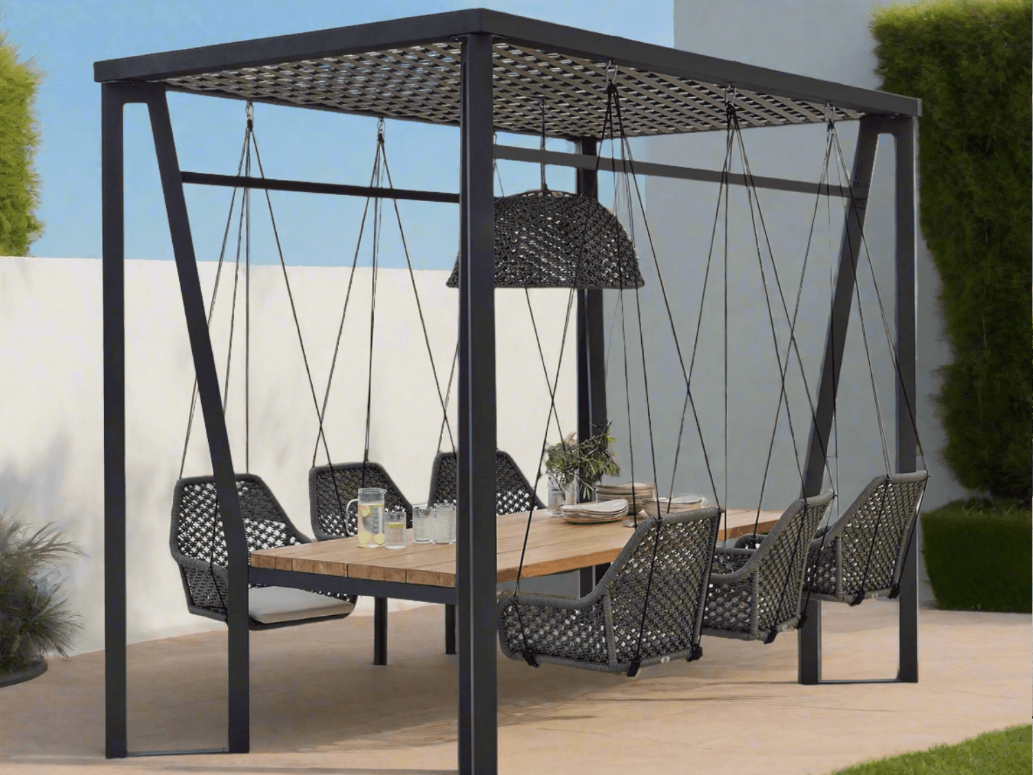 Skyline Design Horizon Pergola with Lamp Hanging Chairs & Teak Table