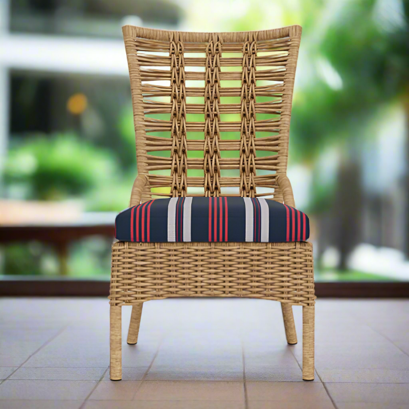 Wicker chair with a striped cushion on a patio
