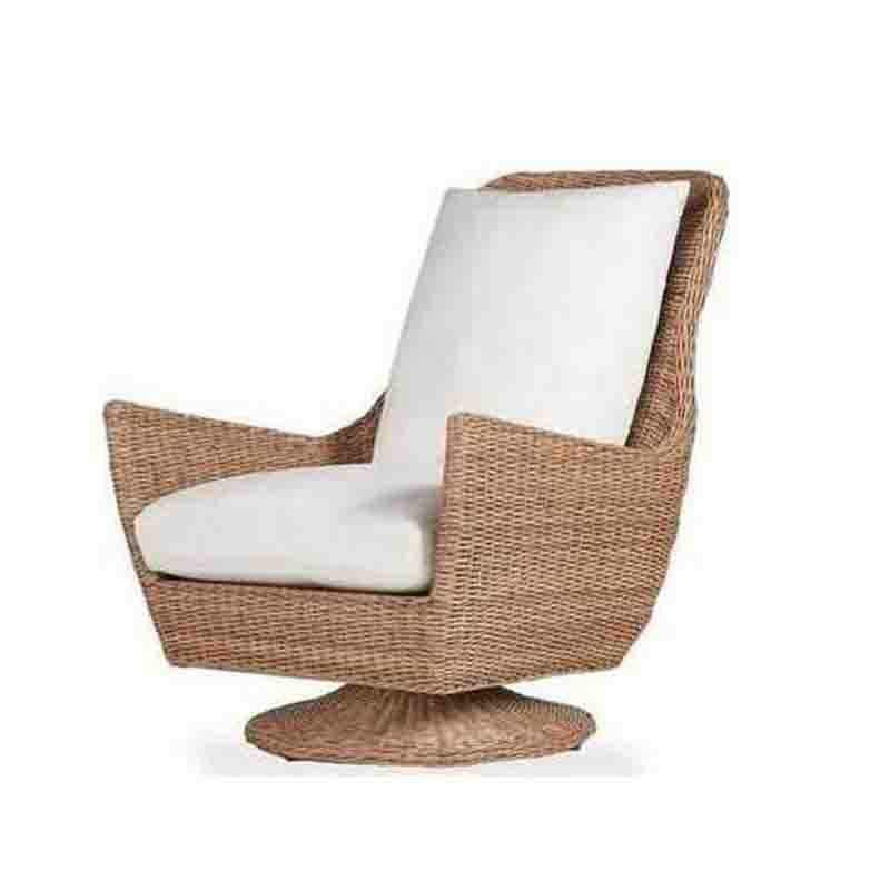 Wicker chair with white cushion on a white background