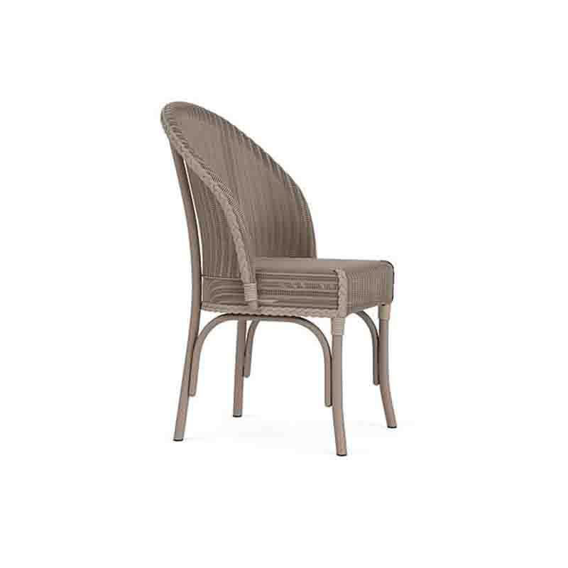 Woven chair with a beige finish on a white background