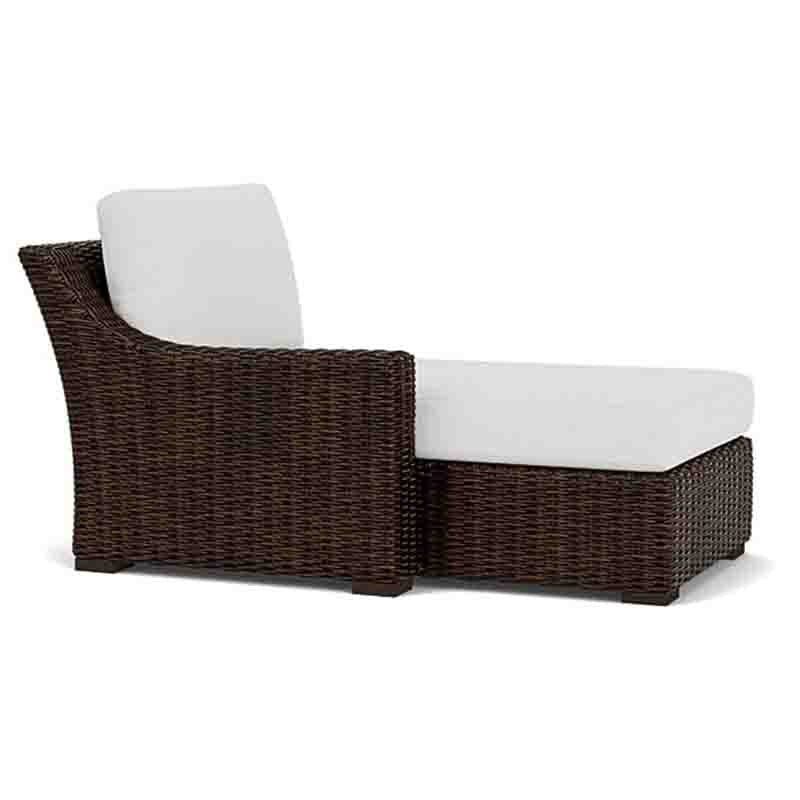 Brown wicker outdoor furniture set with white cushions on a white background