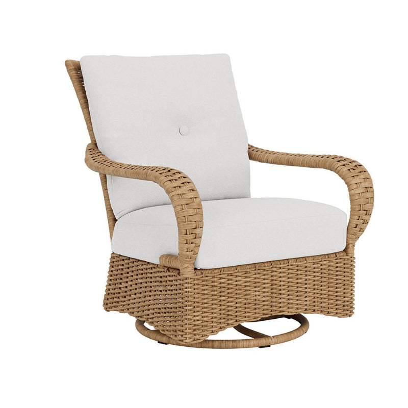 Wicker swivel chair with white cushions on a white background