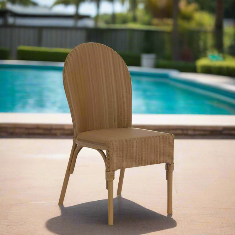 Beige wicker chair by a poolside