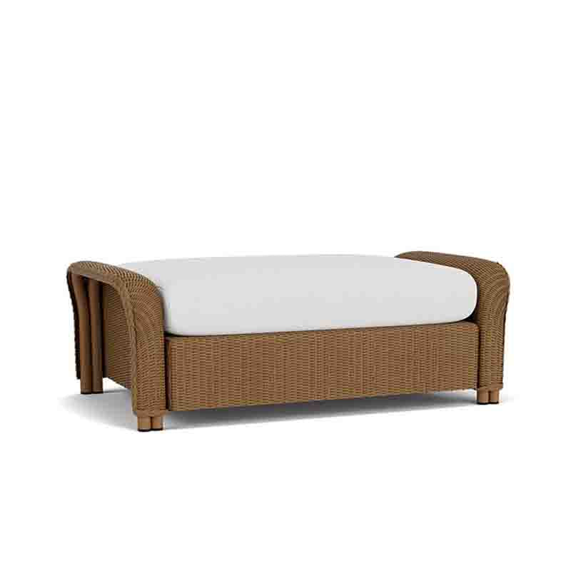 Brown wicker outdoor sofa with a white cushion on a white background
