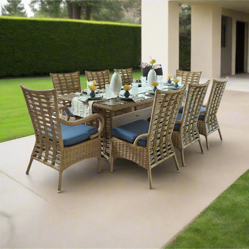 Outdoor dining set with wicker chairs and table on a patio