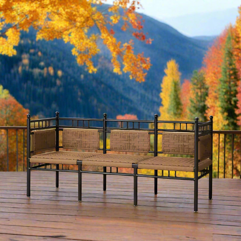 Outdoor bench with woven seat and backrest on a patio