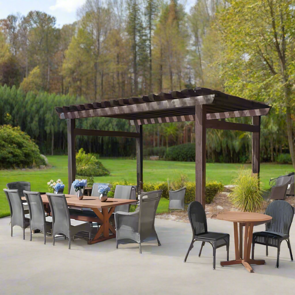 Outdoor patio set with tables, chairs, and a pergola in a garden setting.