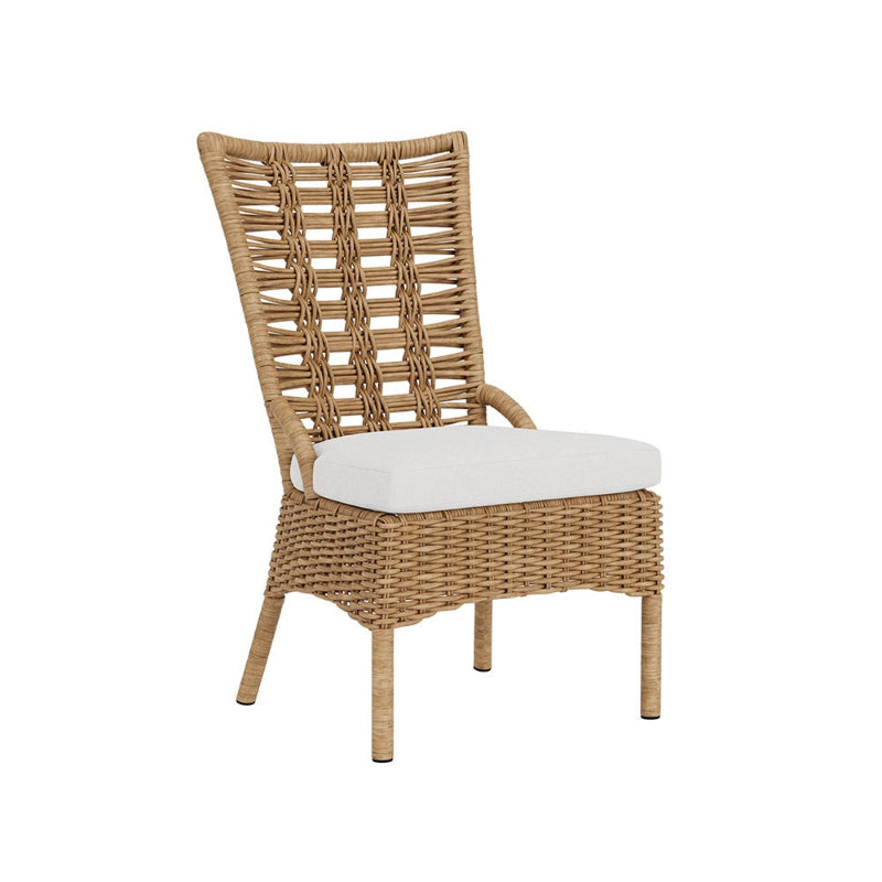 Wicker chair with a white cushion on a white background