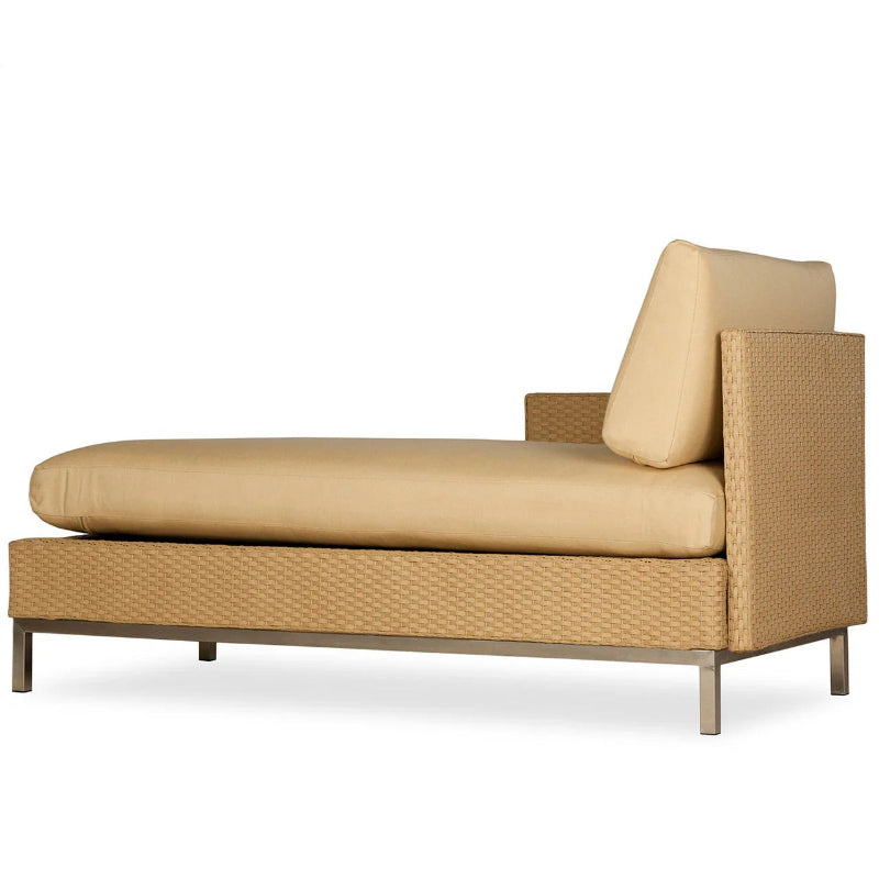 Beige outdoor lounge chair with wicker frame on a white background