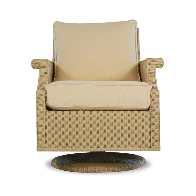 A beige wicker swivel rocker lounge chair with a cushioned seat and backrest, featuring a classic hammered pattern on the frame.