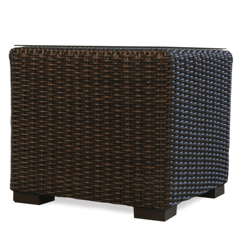 Wicker planter with brown and blue pattern on a white background