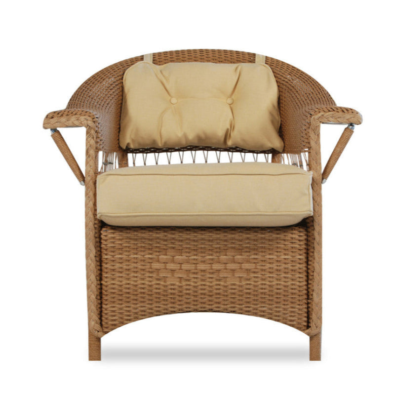 A beige wicker dining arm chair with a cushioned seat and backrest, designed for outdoor patio use.