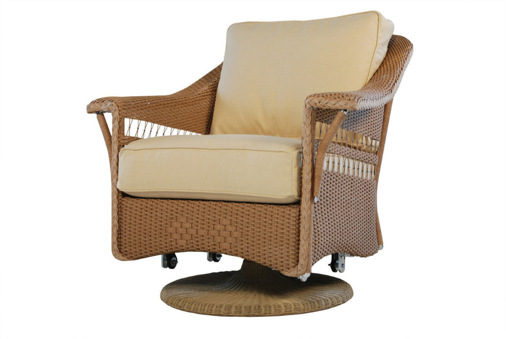 Wicker chair with beige cushions on a white background
