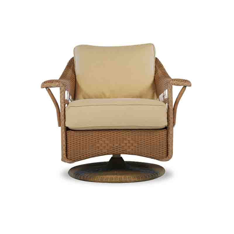 Wicker chair with beige cushion on a white background