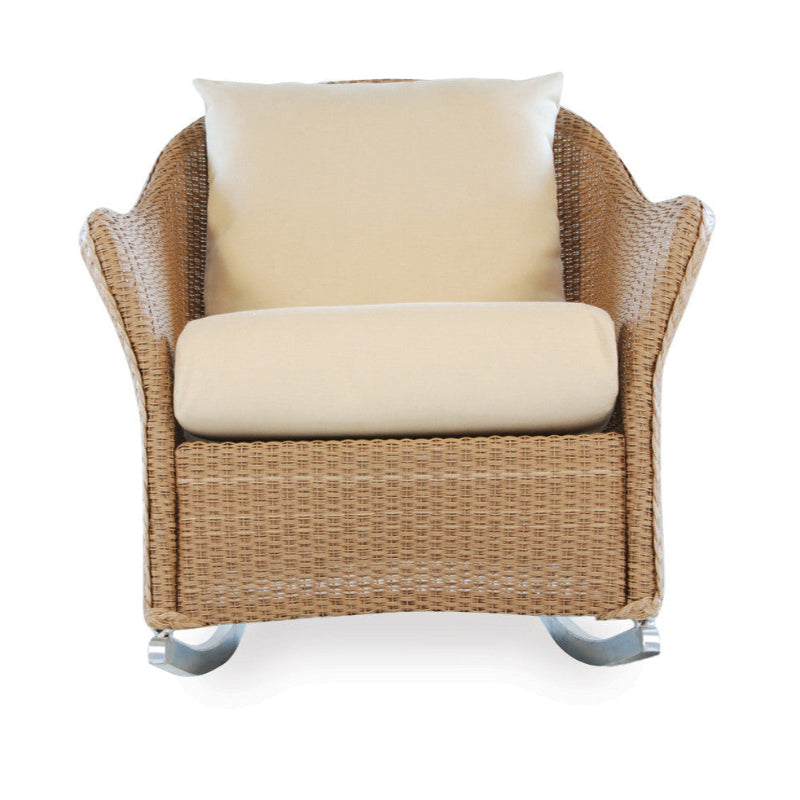 Wicker chair with beige cushions on a white background