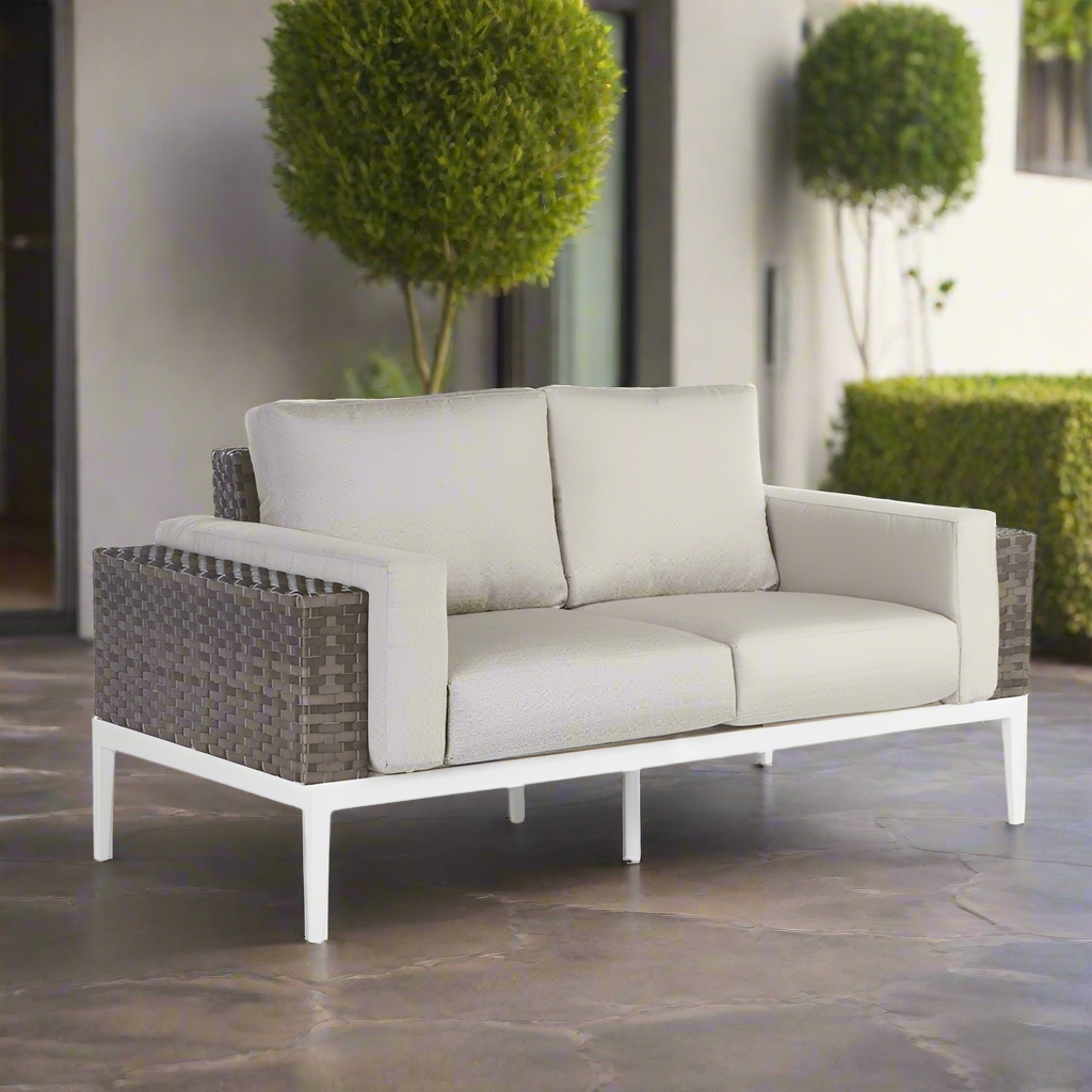 South Sea Rattan Stevie Wicker Loveseat With Arm Bolsters