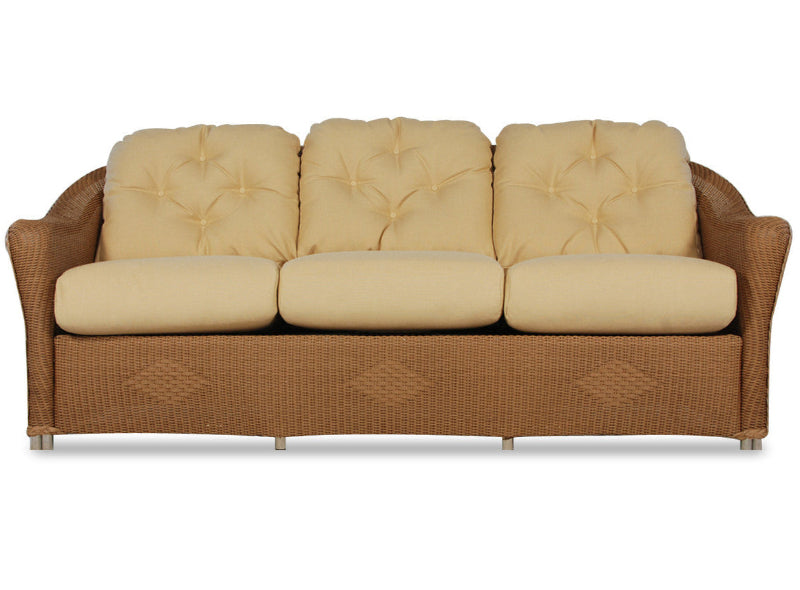 Beige sofa with wicker frame on a white background