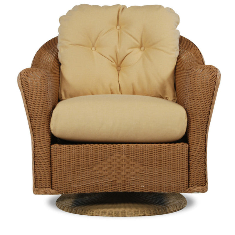 Wicker armchair with beige cushions on a white background