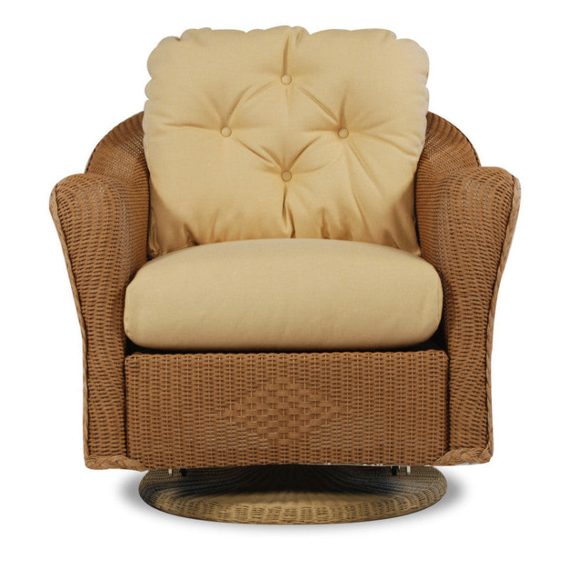 Wicker chair with beige cushions on a white background