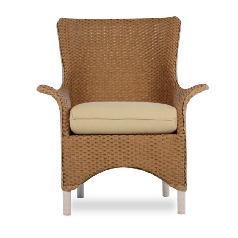 Brown wicker armchair with a beige cushion on a white background