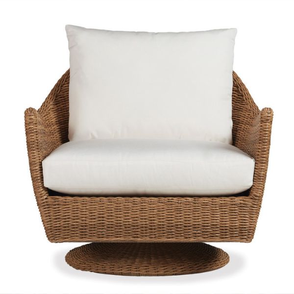 Wicker chair with white cushion on a white background
