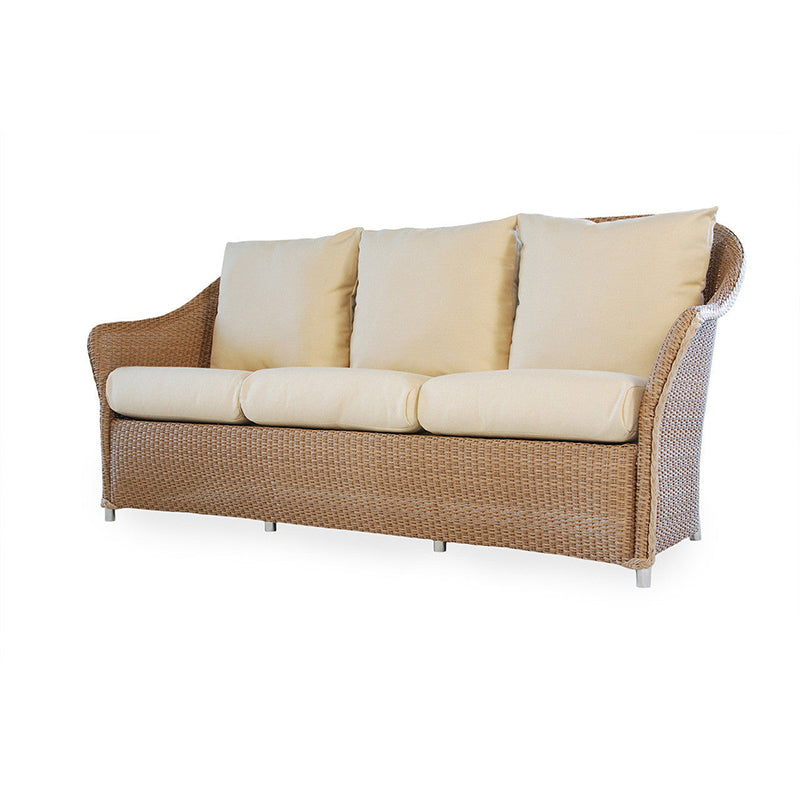 Wicker outdoor sofa with beige cushions on a white background