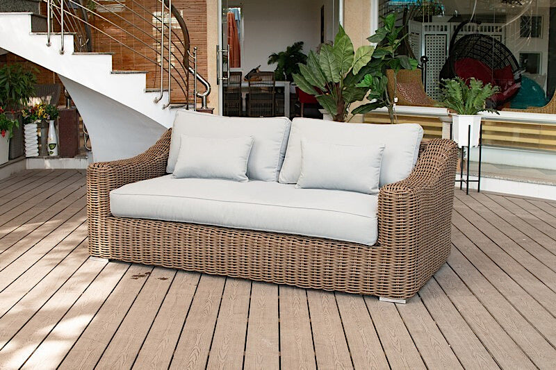 OUTSY Lana 4-Piece Outdoor Wicker Furniture Set in Brown with Wicker Coffee Table - sofa side view