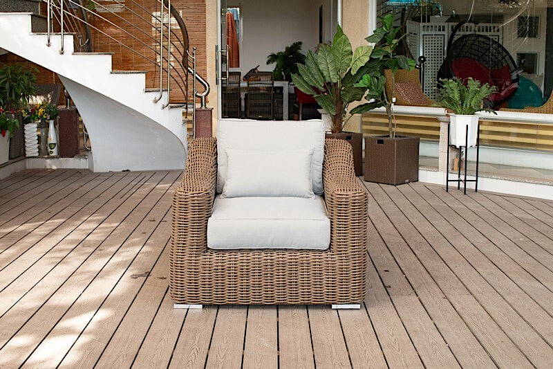 OUTSY Lana 4-Piece Outdoor Wicker Furniture Set in Brown with Wicker Coffee Table - single sofa front view