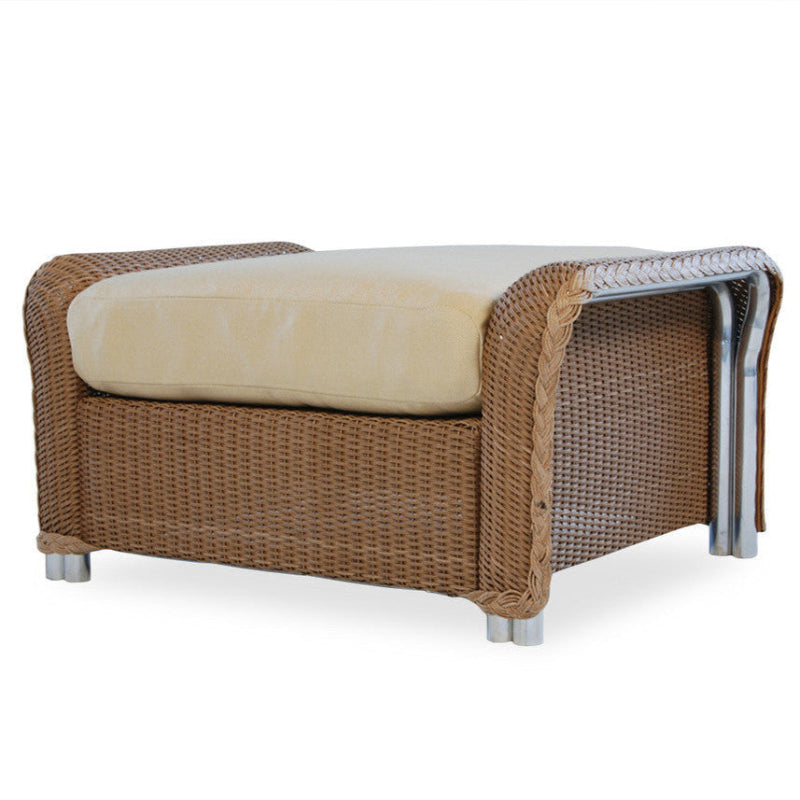 Wicker chair with beige cushion on a white background