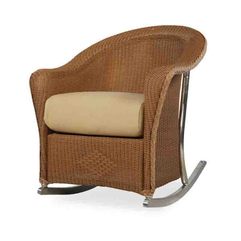 Wicker armchair with beige cushion on a white background