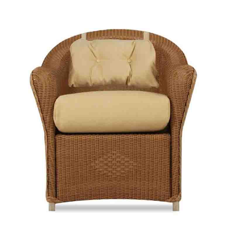 Wicker armchair with beige cushions on a white background
