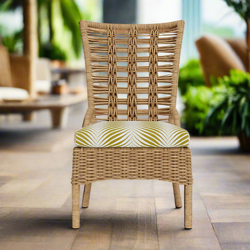 Wicker chair with a patterned cushion on a patio
