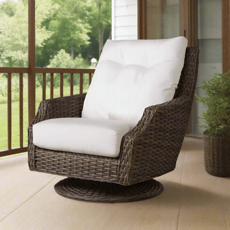 A high back swivel rocker lounge chair with woven vinyl seat and backrest, featuring a white cushion on a patio.