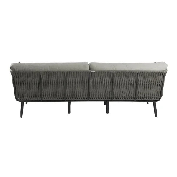 Back view of a sofa with a white background