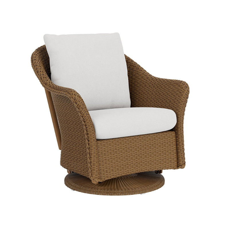 Brown wicker swivel chair with white cushions on a white background