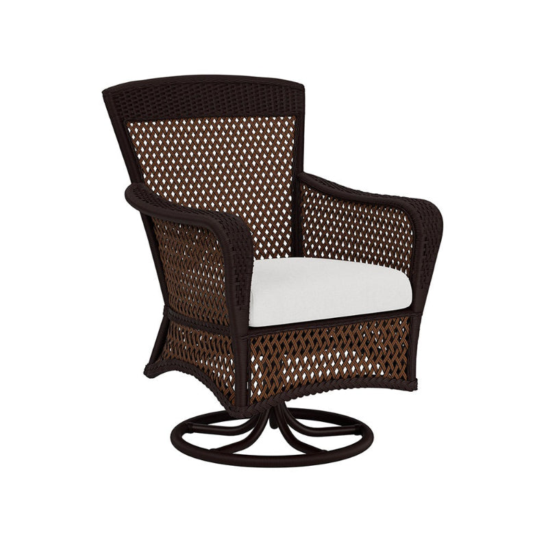 Wicker chair with a white cushion on a white background