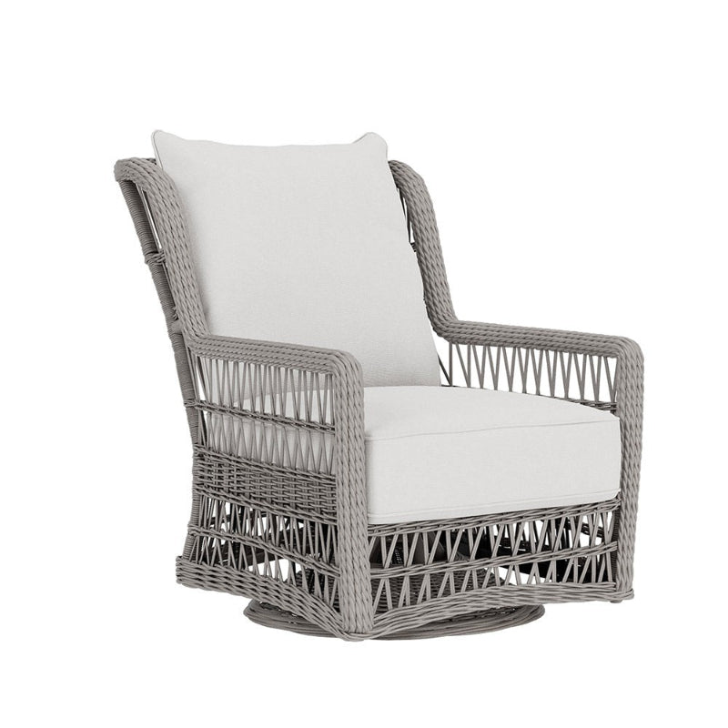Wicker chair with white cushion on a white background