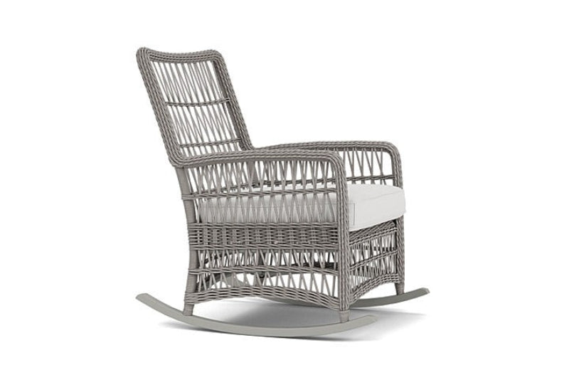 Wicker rocking chair on a white background