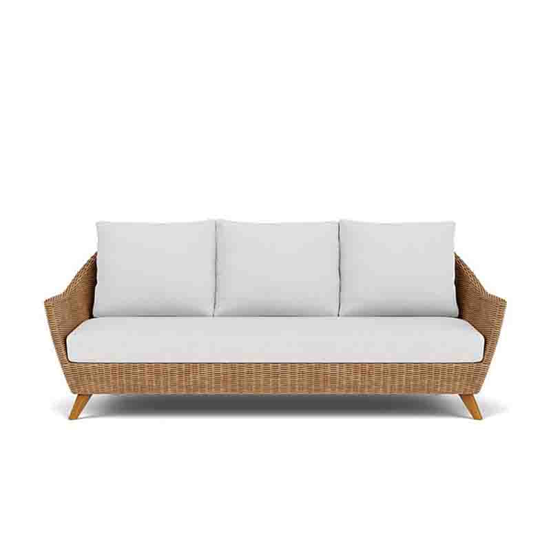 Wicker outdoor sofa with white cushions on a white background