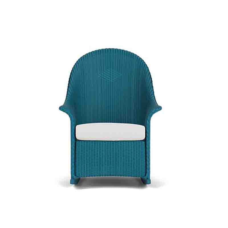Teal wicker chair with a white cushion on a white background