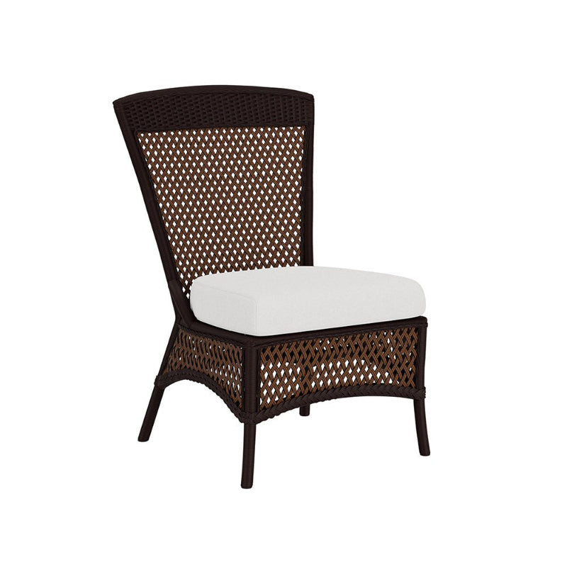 Wicker chair with a white cushion on a white background