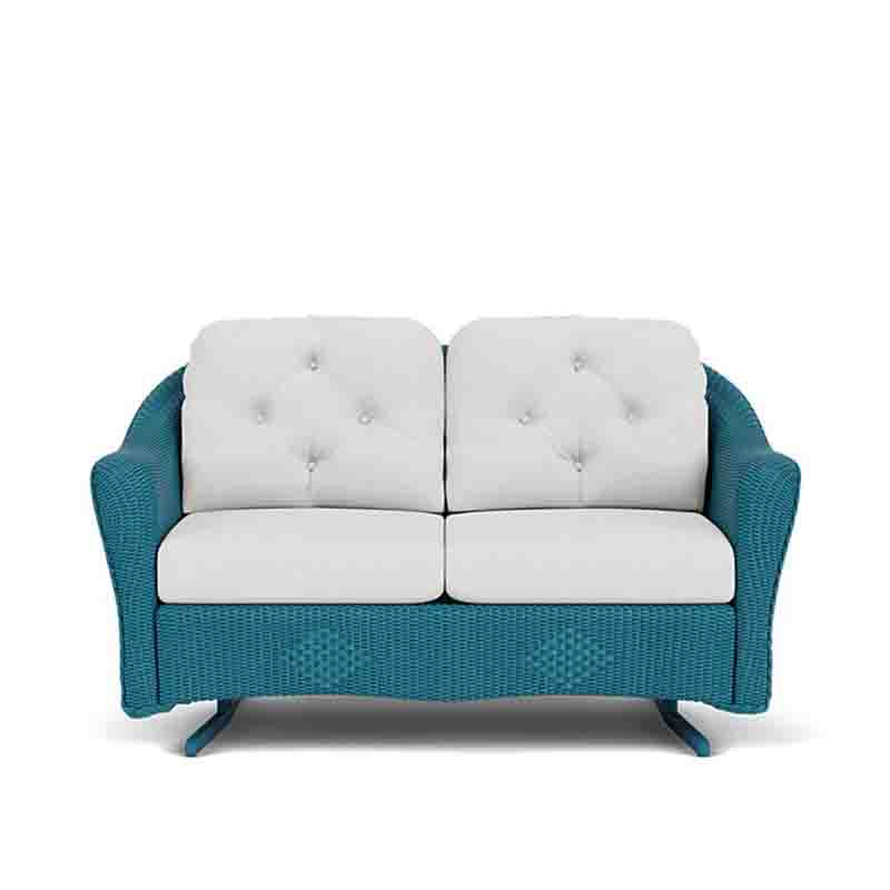 Teal outdoor sofa with white cushions on a white background