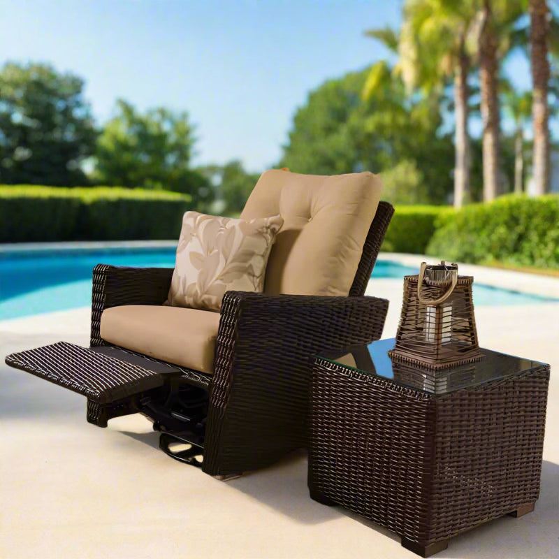 Wicker chair with cushions and a side table by a poolside