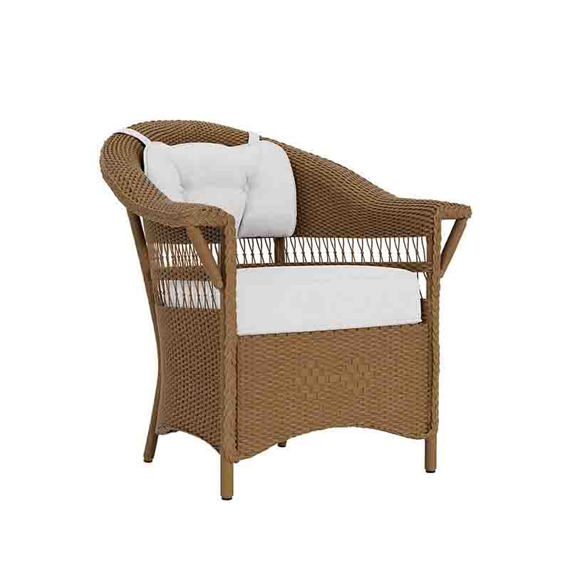 Brown wicker chair with white cushion on a white background