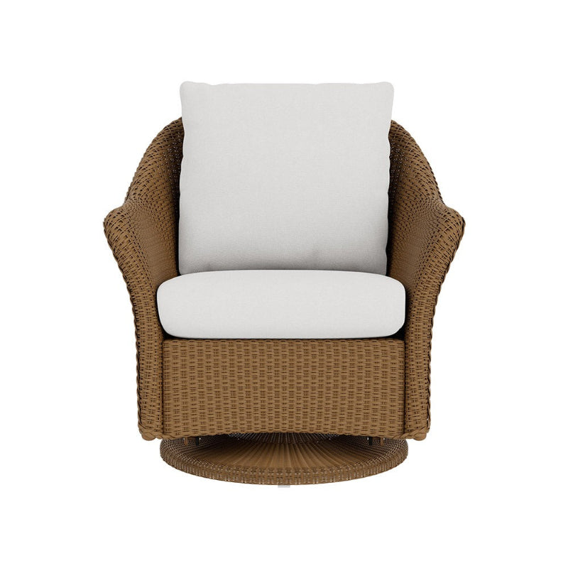 Brown wicker chair with white cushions on a white background