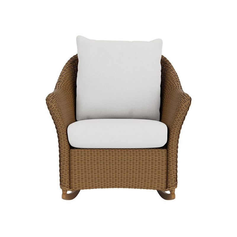 Wicker armchair with white cushions on a white background