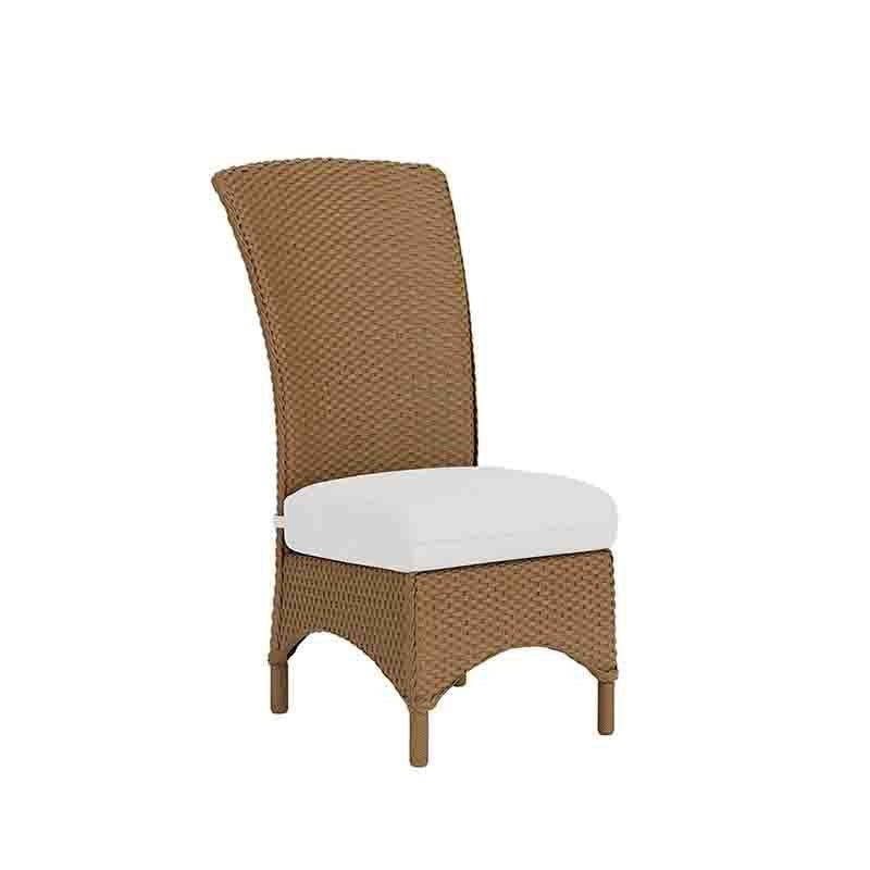 Wicker chair with a white cushion on a white background