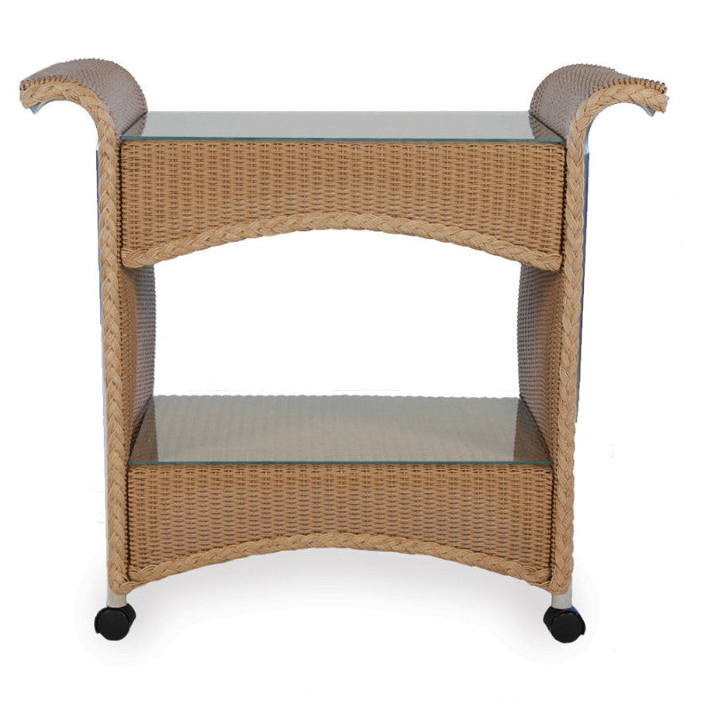 Wicker side table with glass top on a white background